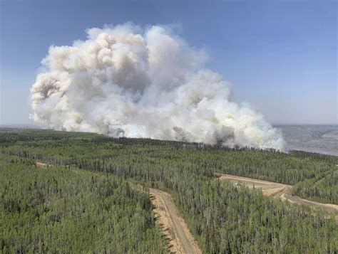 Out-of-control wildfires cause evacuations in western Canada